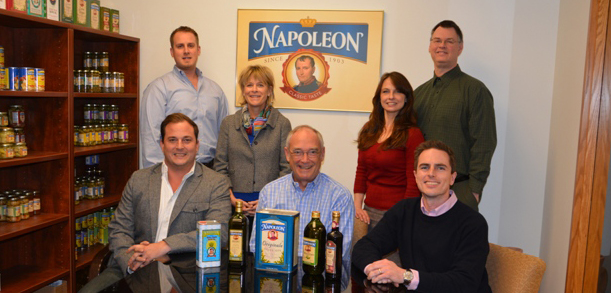 Family Photo with Napoleon logo in the background